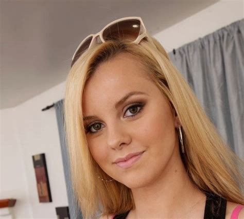 Beautiful blonde Jessie Rogers in fishnet stockings poses for camera. . Jessie rogers pornstar